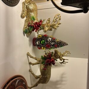 2 gold glittered deer and bottle brush tree with glass ornaments